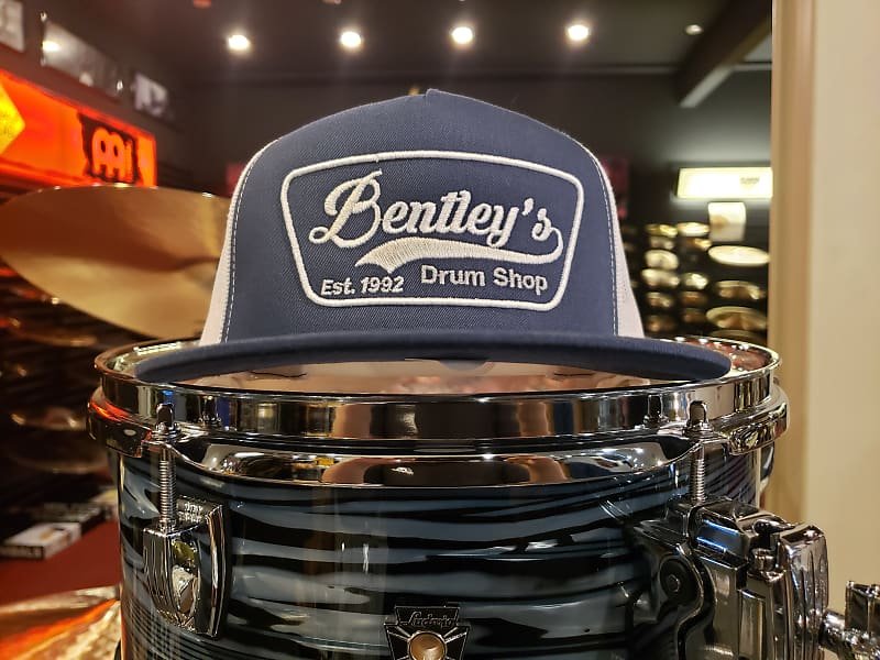 Bentley's Drum Shop Trucker Snapback Hat in Navy Blue and White